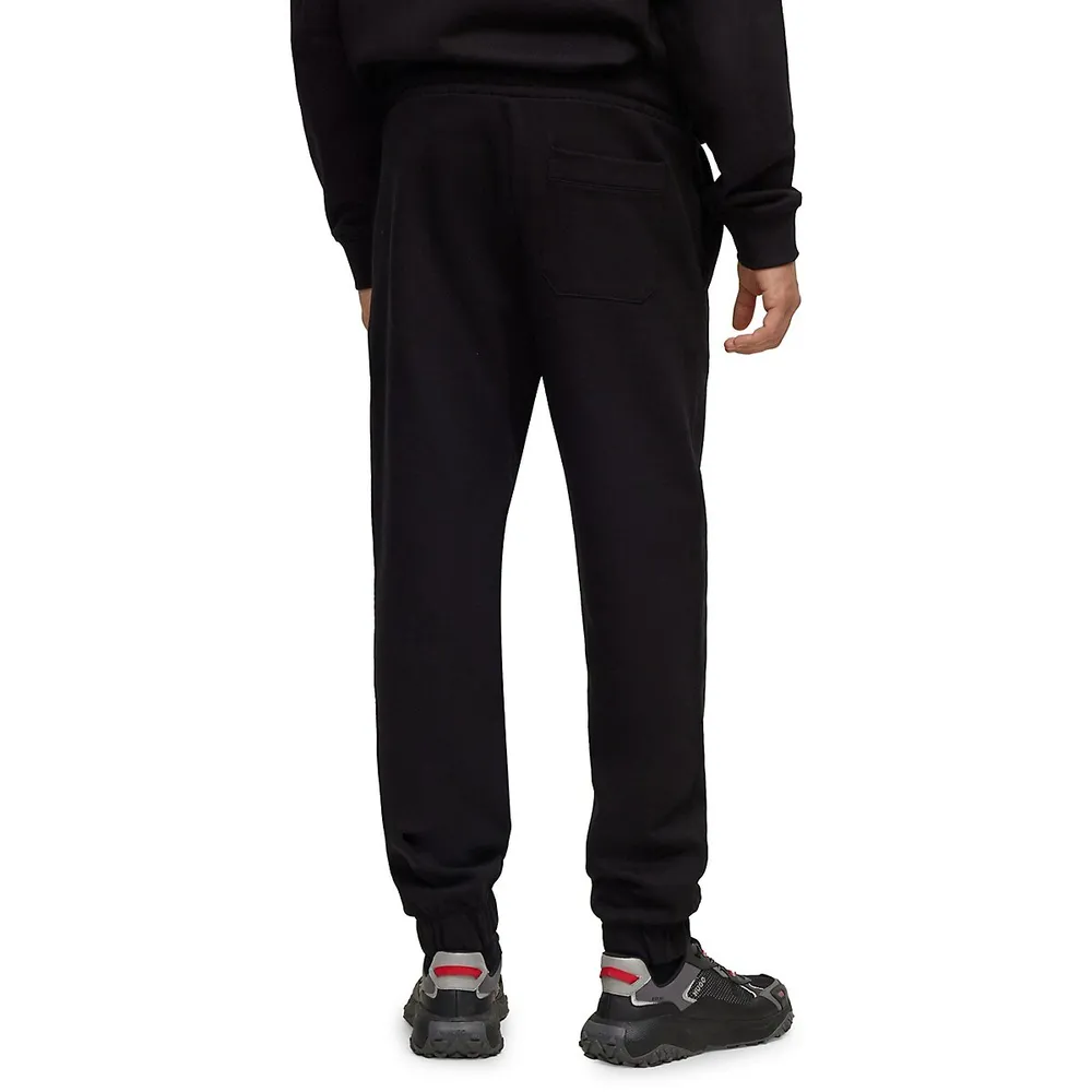 HUGO Relaxed Stacked Embossed Logo Trackpants