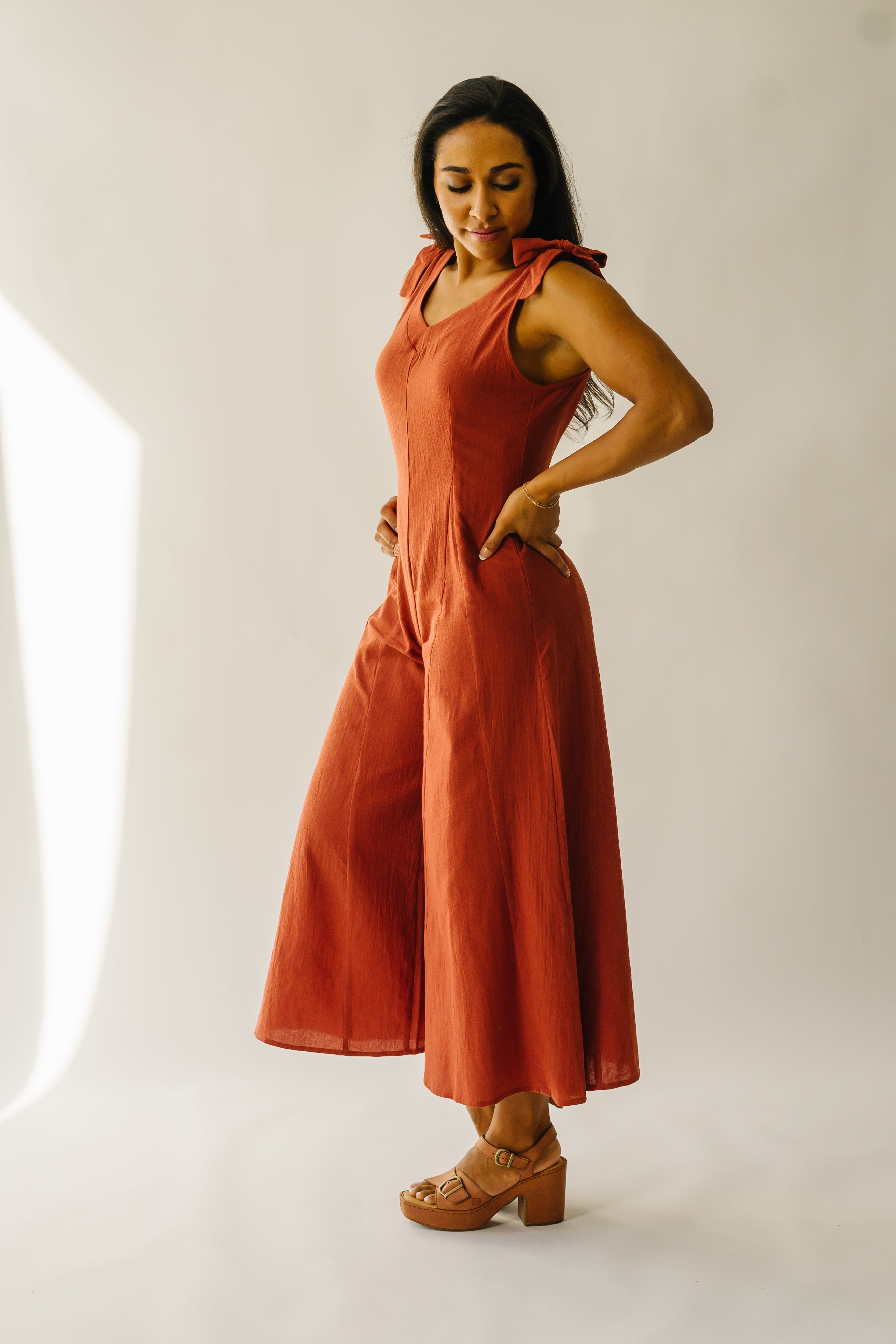 The Evannah Shoulder Tie Jumpsuit in Rust