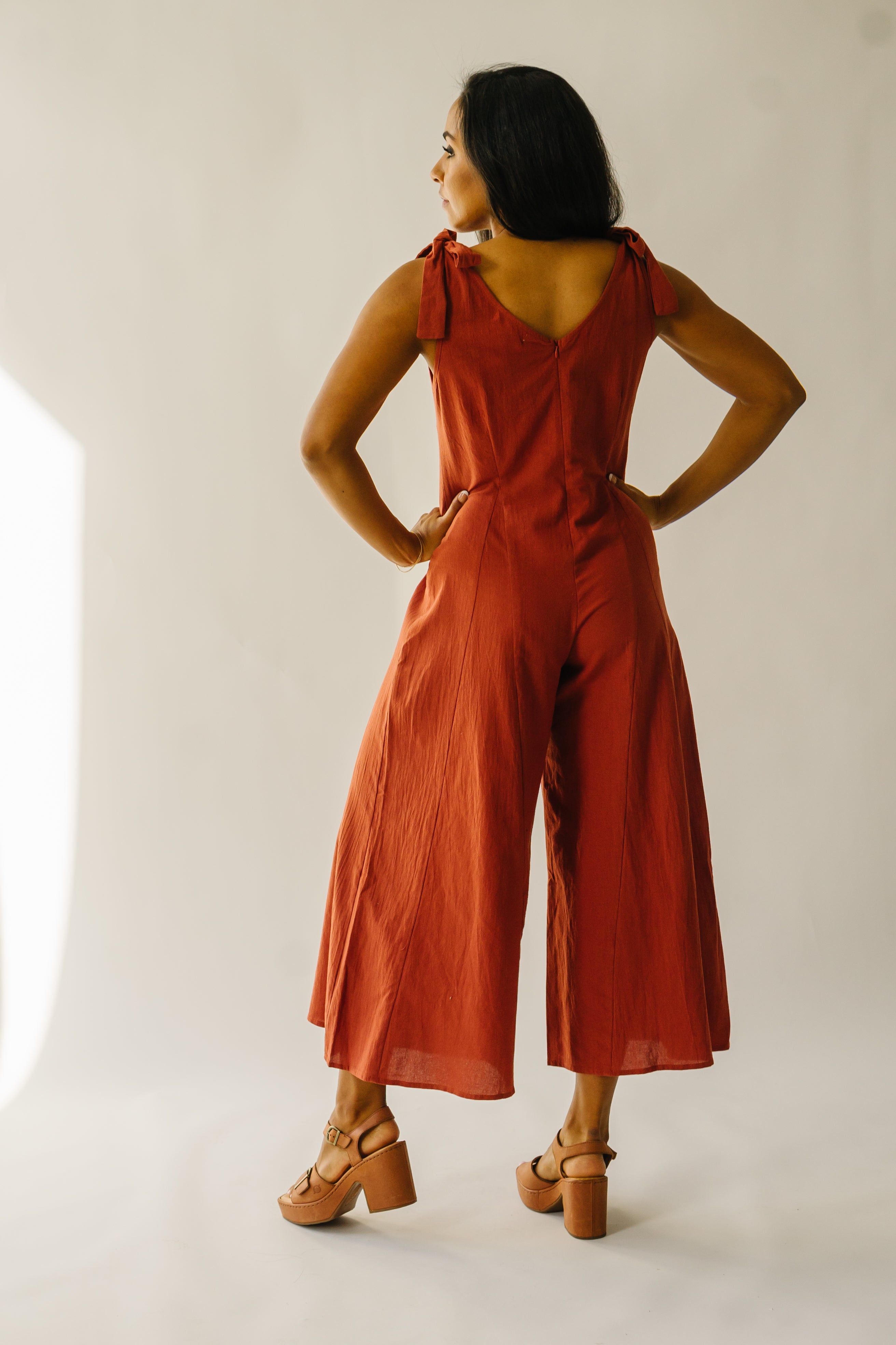 The Evannah Shoulder Tie Jumpsuit in Rust