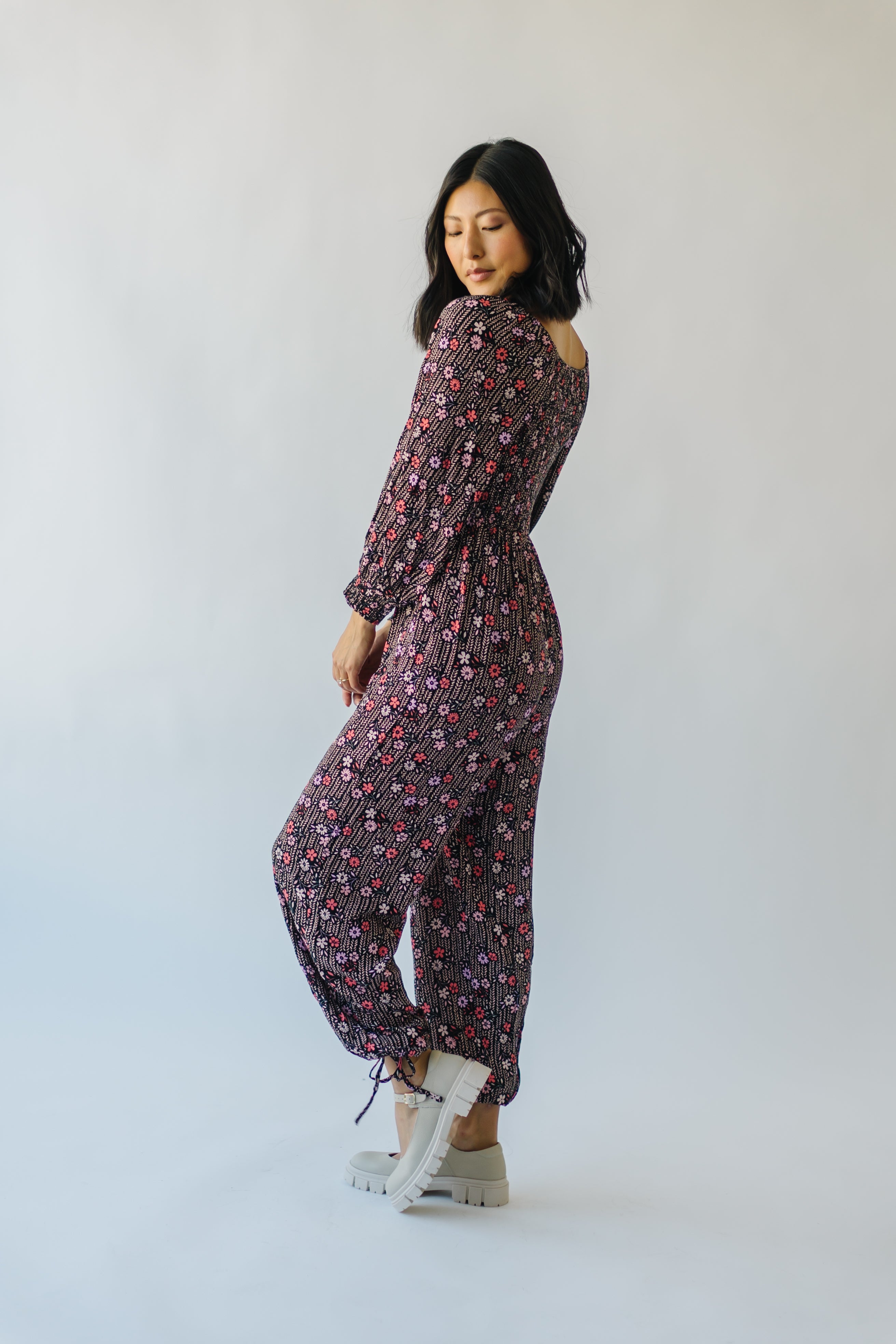 The Ladera Floral Jumpsuit in Black