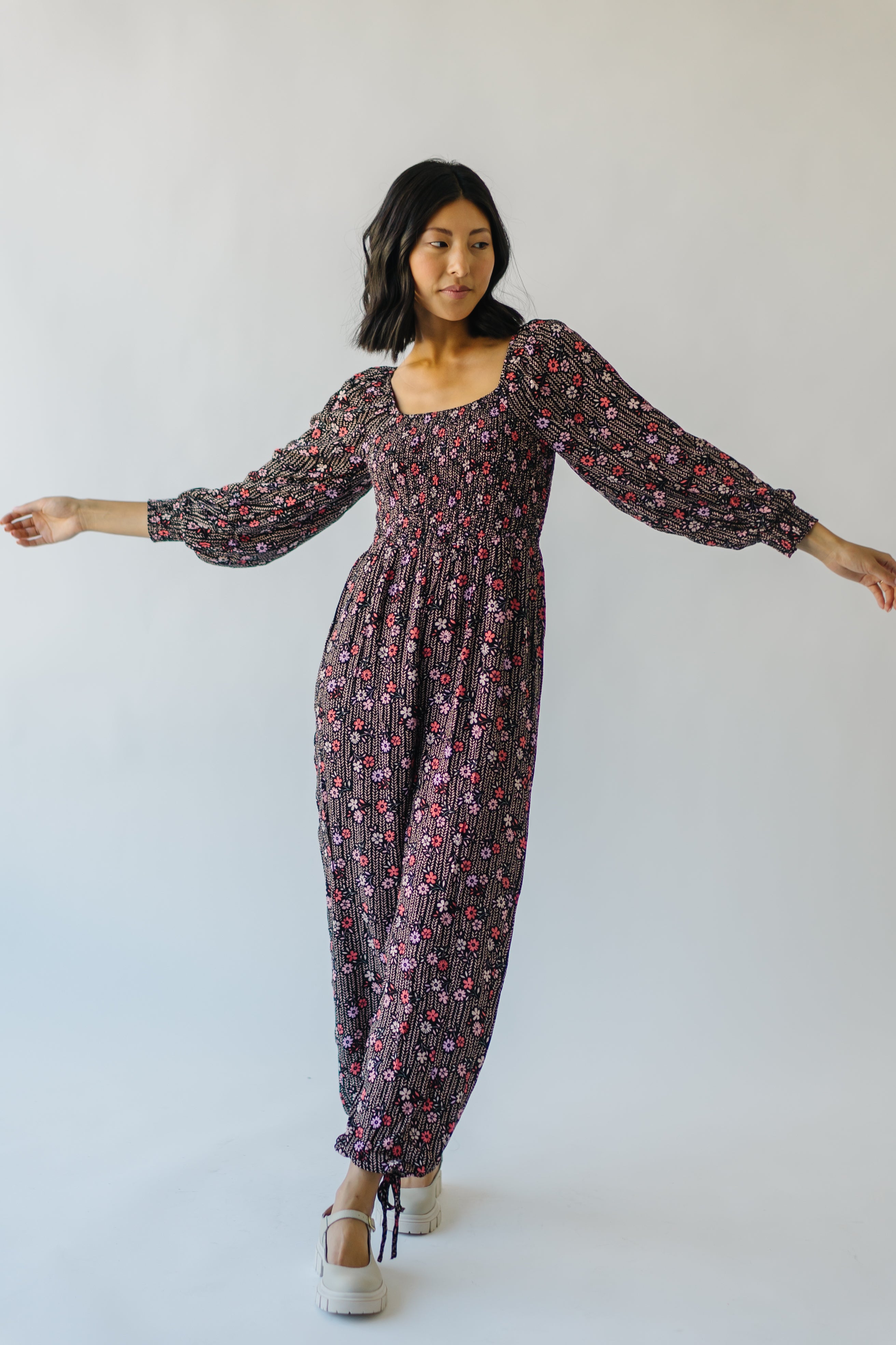 The Ladera Floral Jumpsuit in Black