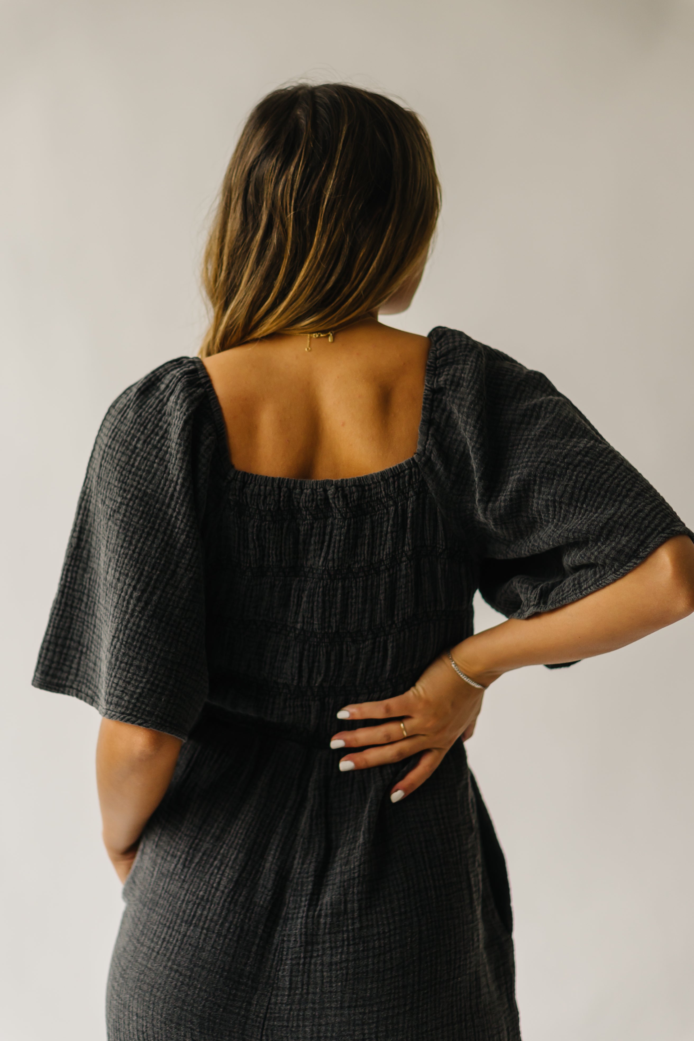 The Slater Smocked Detail Jumpsuit in Washed Charcoal