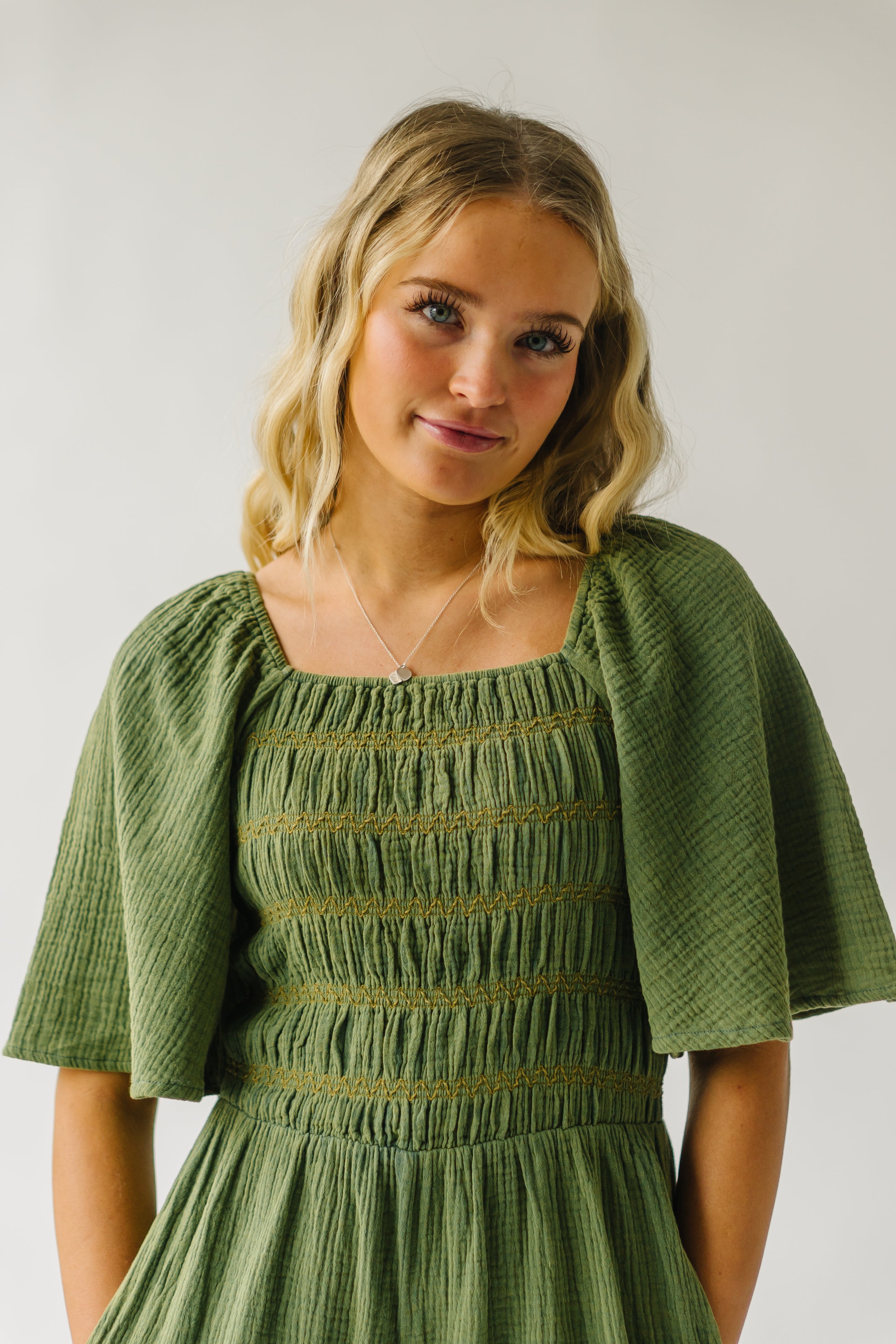 The Slater Smocked Detail Jumpsuit in Washed Green